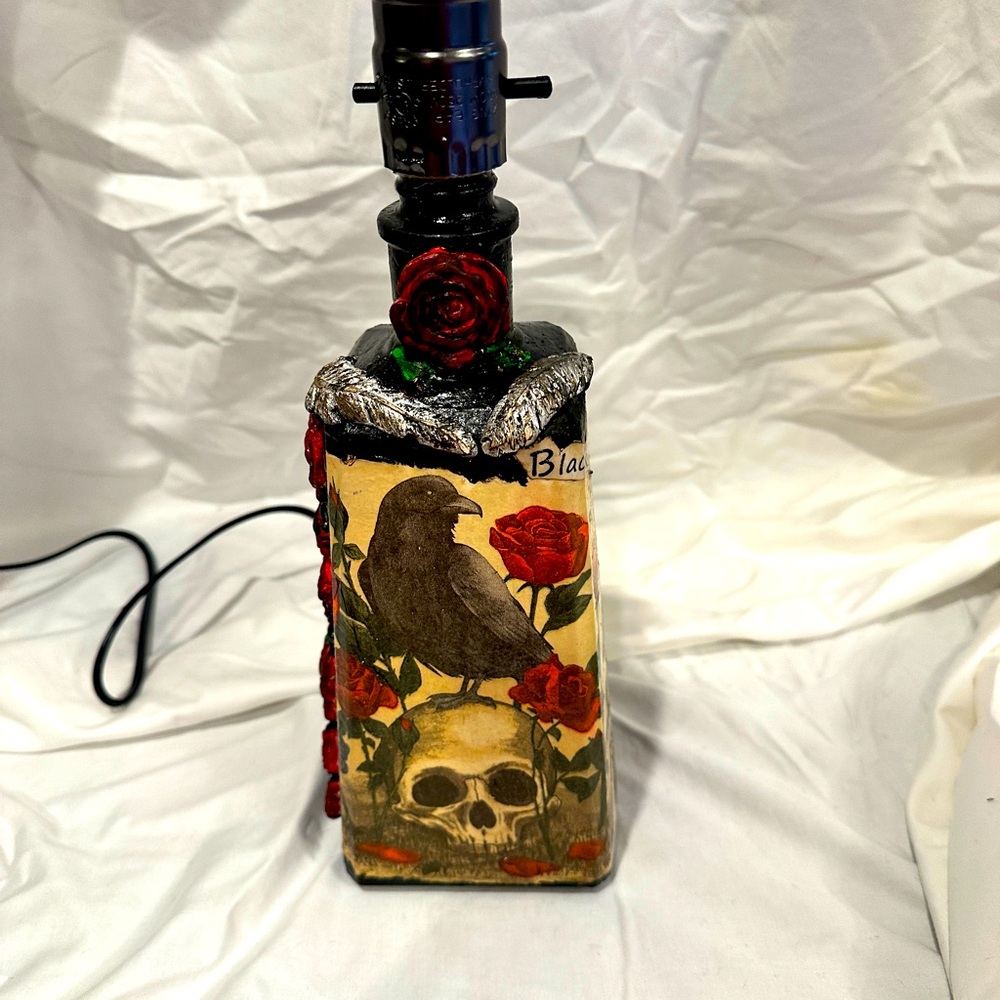 . This up-cycled bottle lamp was inspired by the 1968 Beatles song Black Bird